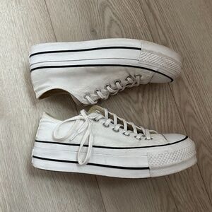 Platform white converse in size 7.5